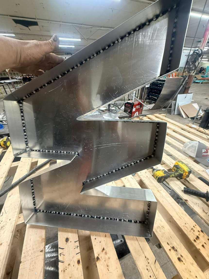 Stitch welded aluminum sign letter with clean bead work in Bunkie, Louisiana