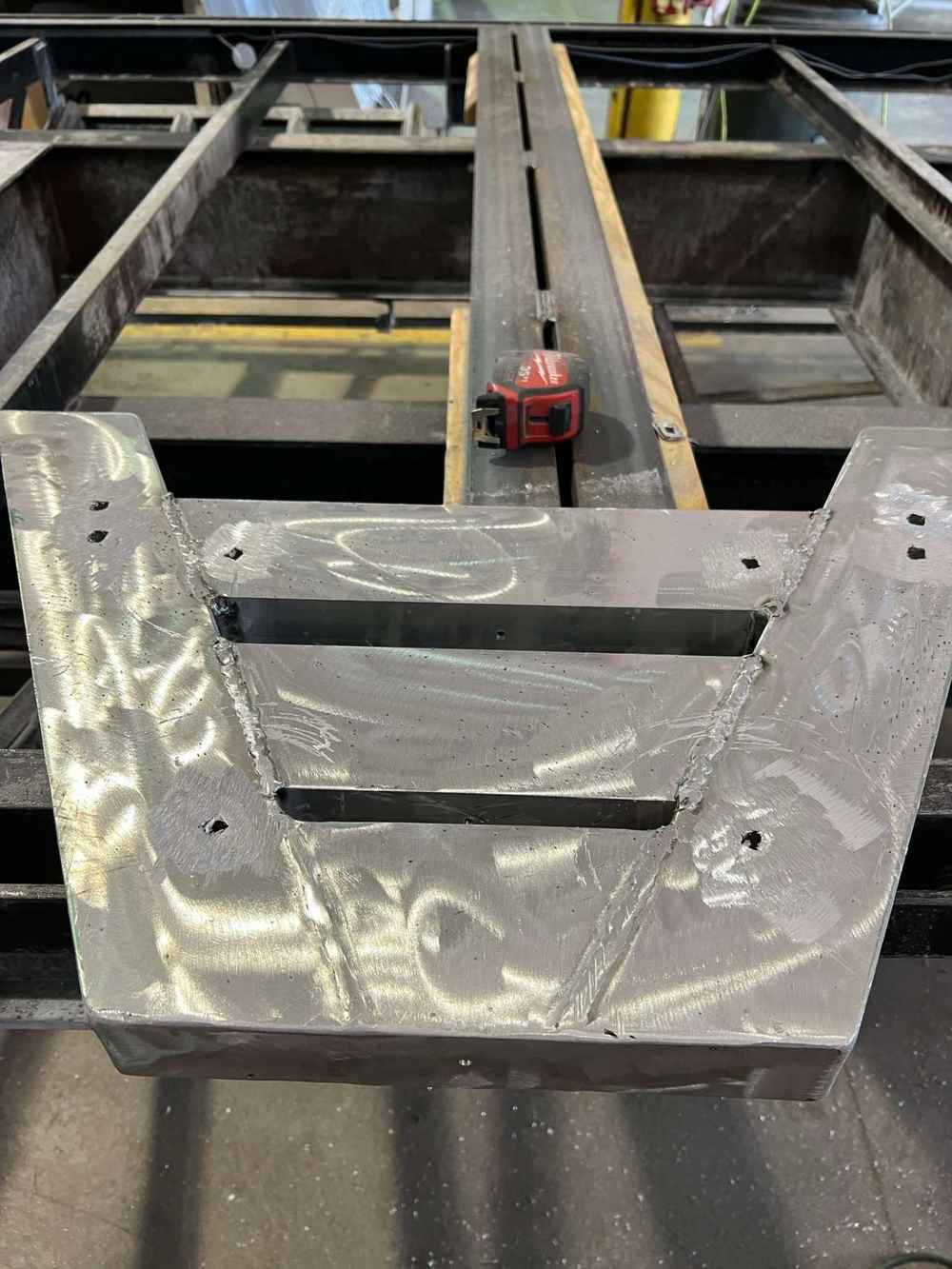 Custom aluminum trailer tongue box fabricated and welded onto a trailer frame in Bunkie, Louisiana