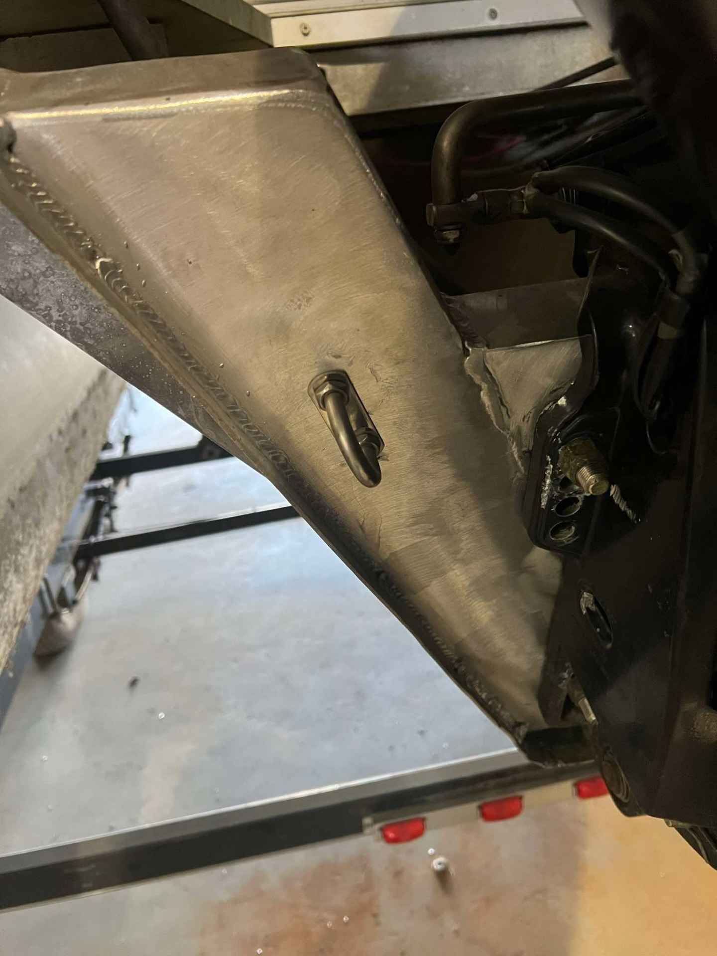 Custom aluminum trailer fender with welded grab handle fabricated by JG's Custom Fabrication in Bunkie, Louisiana