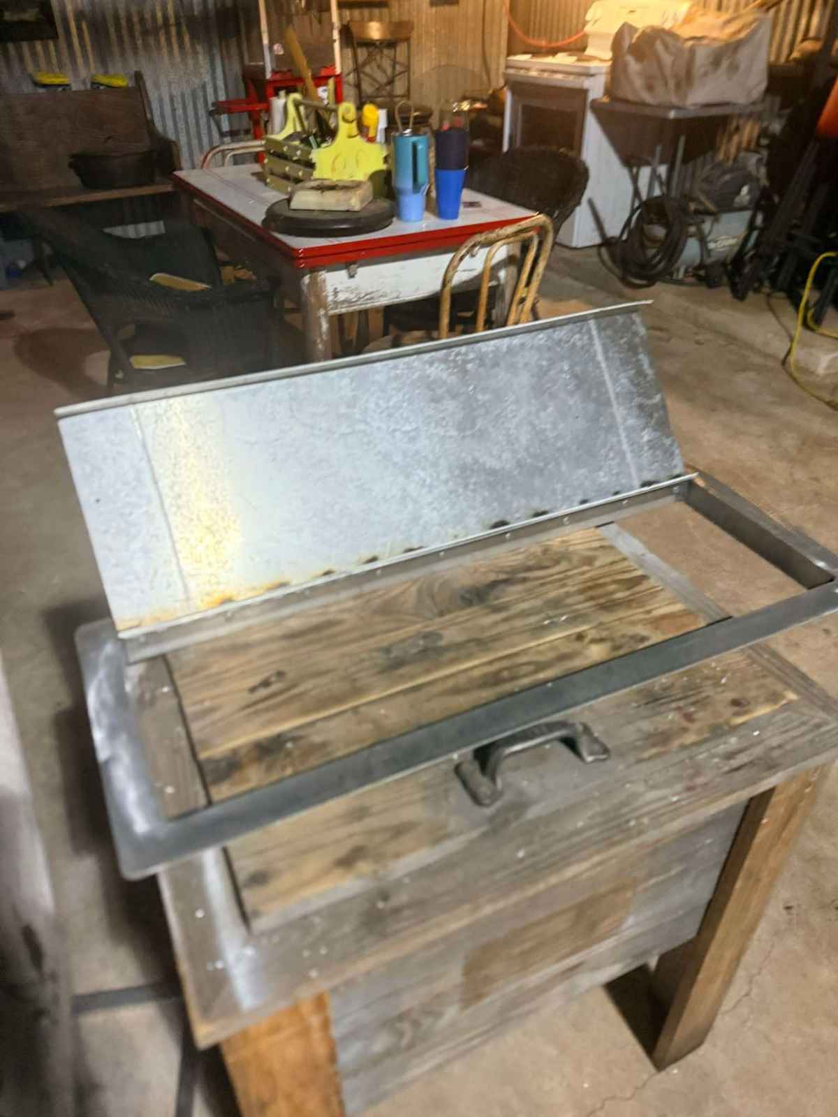 Custom metal hatch lid and welded frame fabricated to fit a wood build in Avoyelles Parish, Louisiana